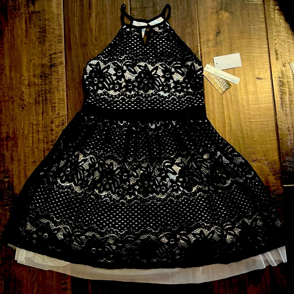 This beautifully crafted Sequin Hearts dress is great for any special occasion.